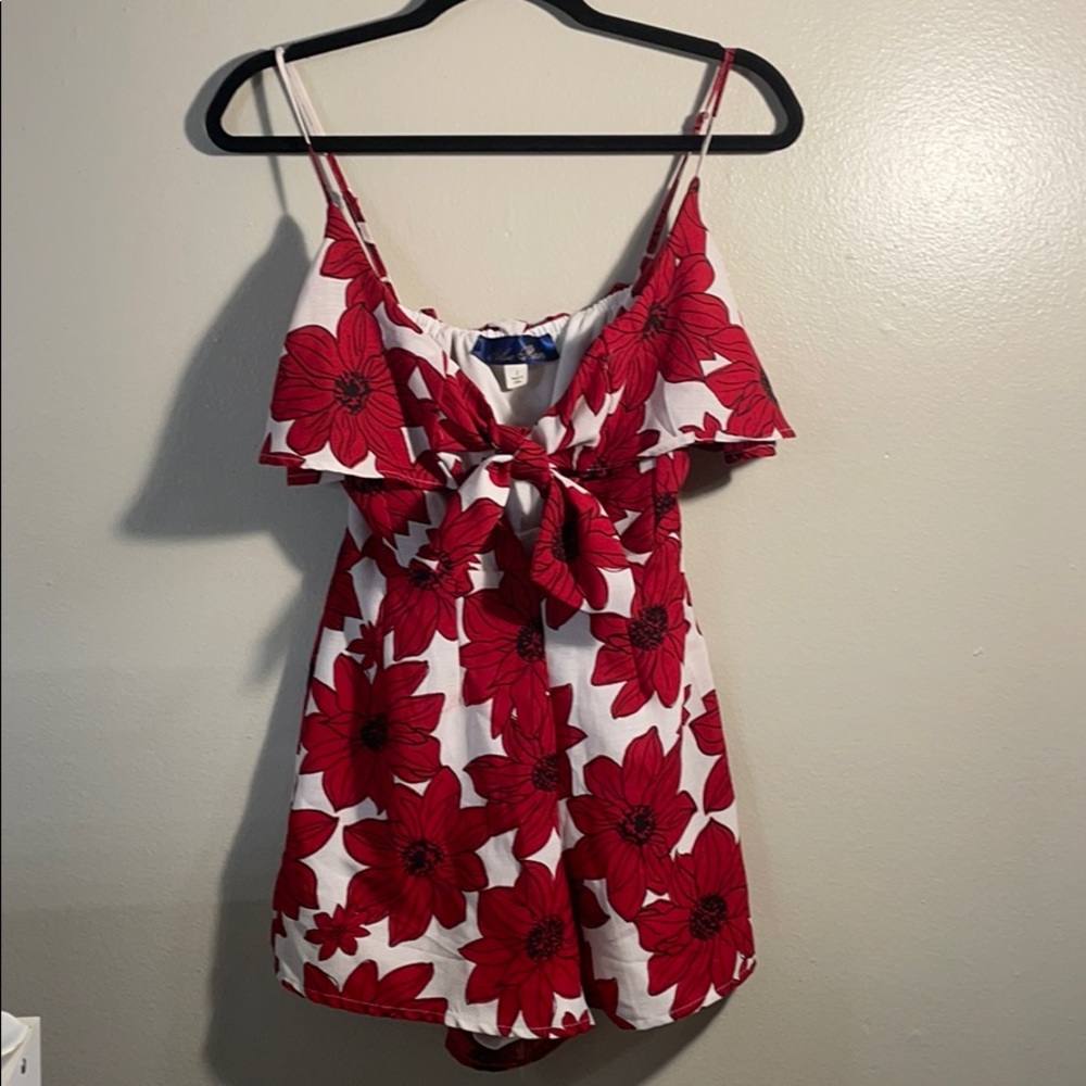 Red flowery romper with cut out tie front